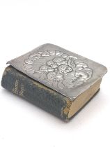 A Birmingham silver common prayer book cherubs.