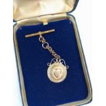 A 9 carat gold medallion and chain. Hallmarked. 4.59 grams.