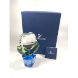 A Swarovski glass flower in Pot. 18cm with booklet and box.