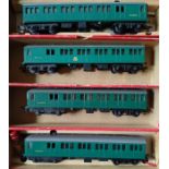 No 150B. Two Triang R.156 SR Suburban Motor Coaches in boxes and two Trailer Coaches (4)