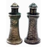 A pair of Indian colonial silver lighthouse condiments. Circa 1900. 7cm high. 122gms (all in).