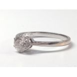 An 18ct white gold Round Brilliant Cut diamond solitaire ring. Diamond 0.50ct. Size M.