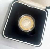 A sterling silver proof £2 coin, fitted case.