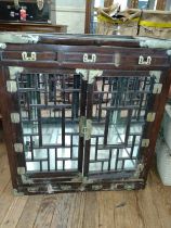 A Chinese rosewood fretwork mirrored cabinet. 96 x 89 x 44cm