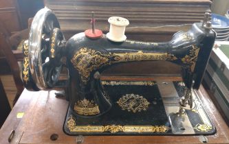 A Singer sewing machine with case