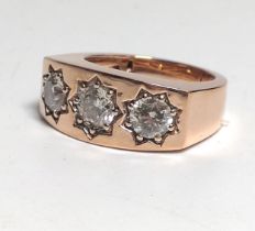 an 18ct rose gold 3-stone gypsy ring. Round Brilliant Cut diamonds 2.40ct. Certificate number