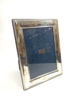 A Sheffield silver 1977 photograph frame size aperture 6.5" x 4.75"