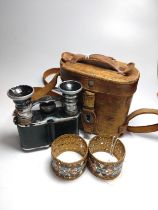 Binoculars/ theatre glasses and a pair of napkin rings Champleve enamel