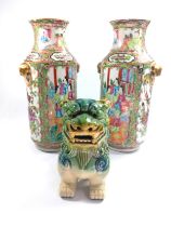 A pair of Chinese Canton famille-rose vases decorated with figures on terrace, 26.5cm (slight