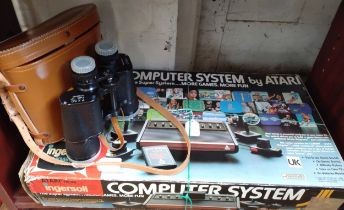 Atari computer system and a pair of Philo binoculars