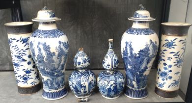 Chinese blue and white ceramics including two gourd vases, pair of baluster vases, and a pair of