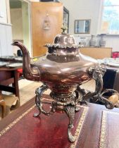 Copper tea kettle on stand with burner. Circa 1900