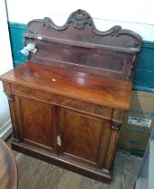 A Victorian mahogany chiffonier with top. Circa 1840.