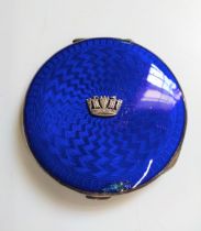 A silver Birmingham 1937 and royal blue enamel AF compact with applied silver Royal Navy crown