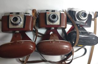 Three vintage cameras