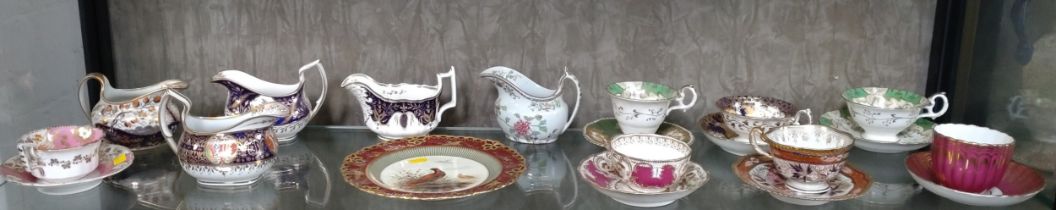 A Crown Derby plate with Grouse painting 21.5cm, English porcelain jugs and cups with saucers. (20)