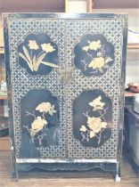 A pair of Chinese Lacquered Two door cabinets. Vintage. With applied floral decoration. 95cm x