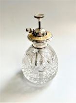 A Sterling Silver Enamel and Cut glass Atomizer Circa 1933.