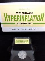 An aluminium German hyperinflation coin 1923 with packaging.