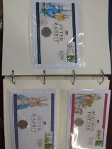 The Tales of Beatrix Potter UK Coin Cover Collection-fifteen in album with certificate no. 1853.