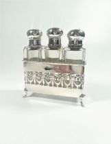 A triple scent bottle on a sterling Silver stand. Elkington & Co. Birmingham 1913. 62 grams of