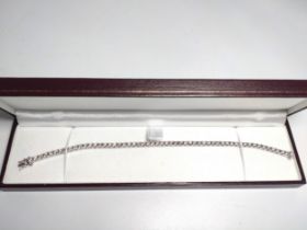 An 18ct white gold diamond line bracelet, boxed. Round Brilliant Cut diamonds 5.00ct. Certificate