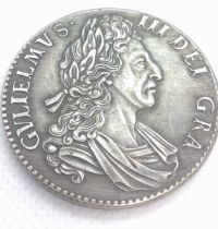 A reproductionWilliam III crown dated 1700. 26.4gms.