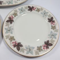Royal Doulton Camelot pattern dinner plates and two oval platters. (23)
