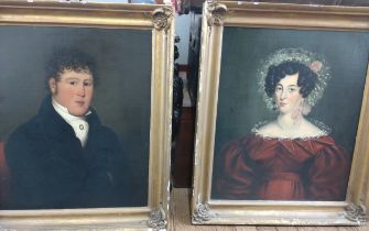 Two framed oil on canvas portraits