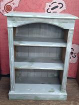 A primed open bookcase. 92cm x 64cm x 35cm.