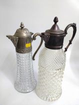 Two cut-glass decanter/ claret jugs with silver-plate spout tops