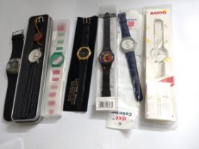 A collection of seven various watches, six with boxes/cases.