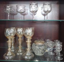 Five amber tinted wine glasses 18cm, two pairs of wine glasses, five liquor glasses and a sugar bowl