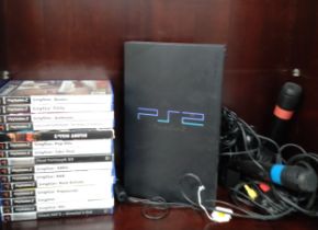 PS2 box and games