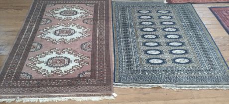 Two Pakistan Bokhara rugs (blue and mushroom) (2)