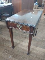 A 20th century mahogany Pembrook table. 72cm x 76cm x 90cm when extended.