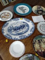 A Johnson Bros. oval coaching scene blue and white dish, 36cm, twenty-seven plates including one