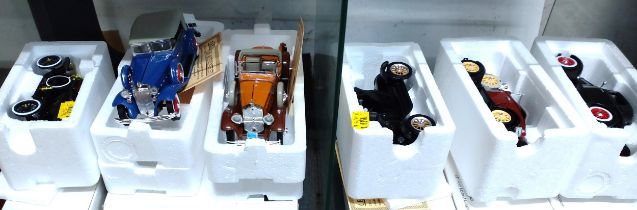 Six Signature Models including 1930 Packard and Chevrolet Lebaron in boxes. (6)