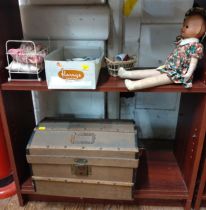 A small West German baby doll 11cm with bed on wheels, 20cm, a french doll (eyes dislodged), 41cm,