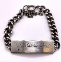 A silver identity bracelet, with curb-link bracelet, inscribed with name 'Rutherford', 41.5 grams.