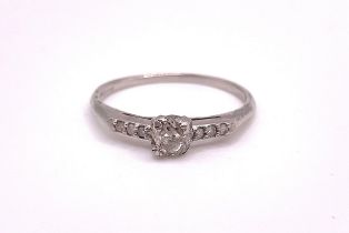 A diamond ring, set with a mixed old-cut diamond, measuring approximately 4.8 x 3.9, claw-set,