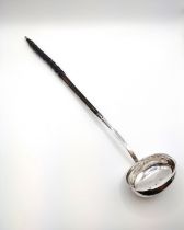 A George III silver whalebone handled punch ladle, hallmarked to interior of bowl, approximately