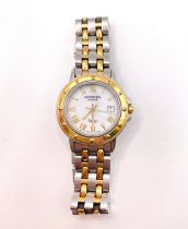A ladies Raymond Weil stainless steel wristwatch, the white dial with gilt Roman numerals, date