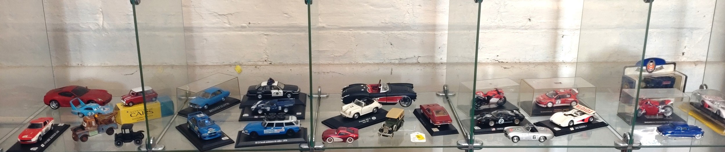 Twenty-five diecast models including Corgi Austin Mini Cooper, Maisto Chevrolet Corvette, New Ray