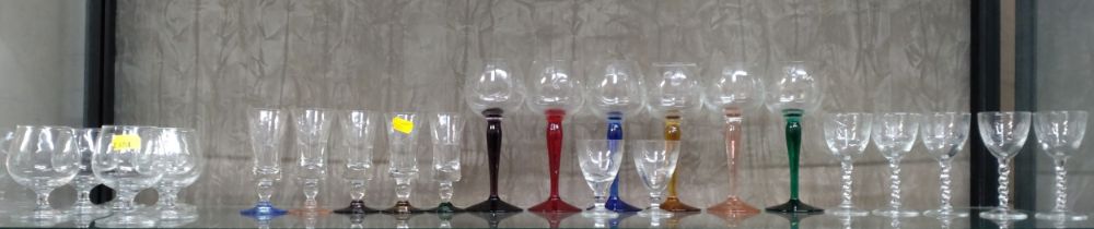 Six wine glasses with different coloured stems 18.5cm, five spirit glasses with different coloured