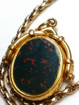 A late 19th / early 20th century 18ct yellow gold mounted bloodstone and onyx fob pendant,