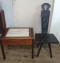 A wooden piano stool with embroidered seat, together with a Victorian carved and ebonies wooden