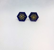 A pair of silver gilt octagonal lapis lazuli cufflinks set with star, yellow rose-cut and further