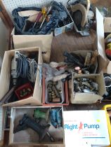 A collection of vintage tools including: a box of drill bits and augers, a box of saws, a box of