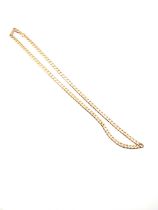 A 9ct yellow gold flattened curb link chain necklace, 44 cm long, marked to clasp 375.